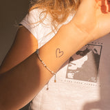 Schmales & Offenes Herz Tattoo