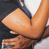 Küssende Gesichter Tattoo