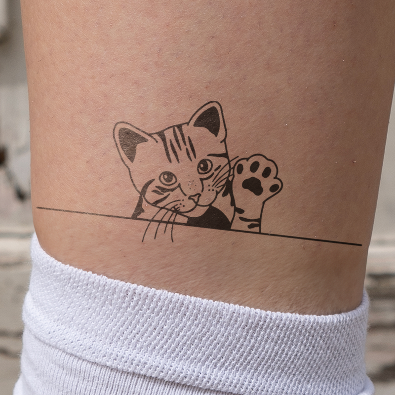 Winkende Katze Tattoo