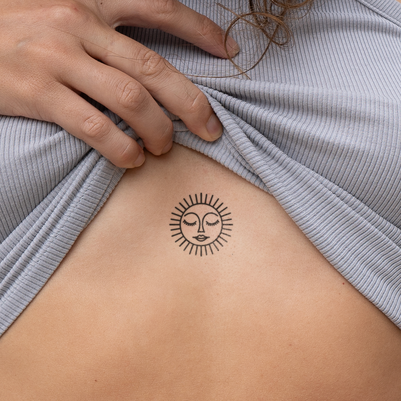 Smiley in Sonne Tattoo