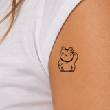 Süße Winkekatze Tattoo