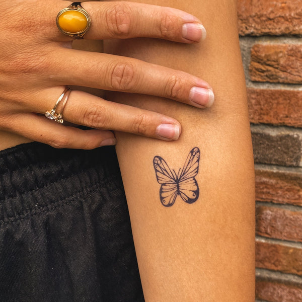 Feiner Schmetterling Tattoo